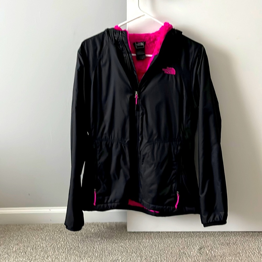 The North Face Women’s Black and Pink jacket.